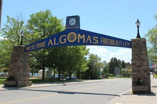 Stone welcome arch in Sault Ste. Marie, Ontario, a Rural Community Immigration Pilot community
